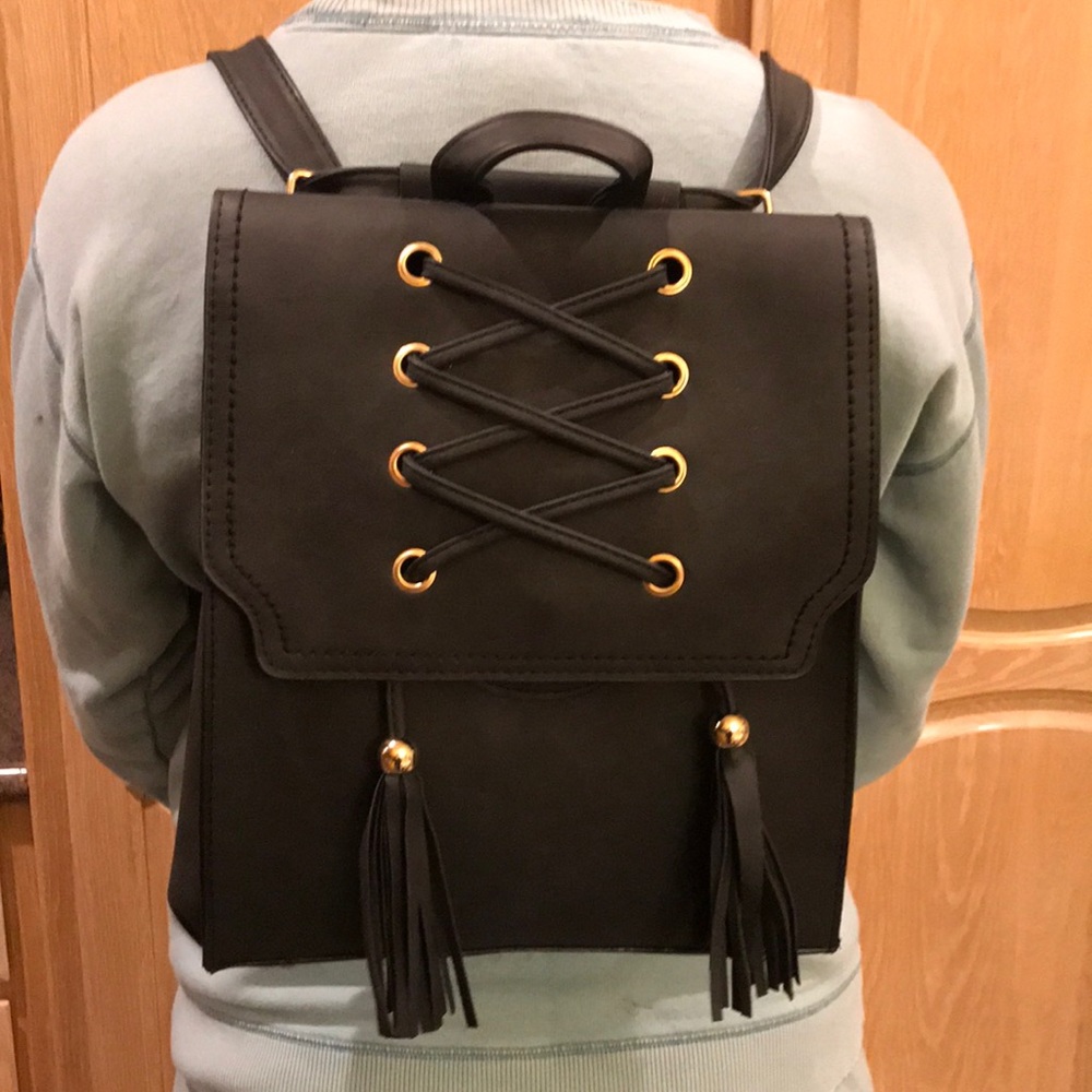 Trendy criss cross string w tassel backpack - Picture 1 of 7
